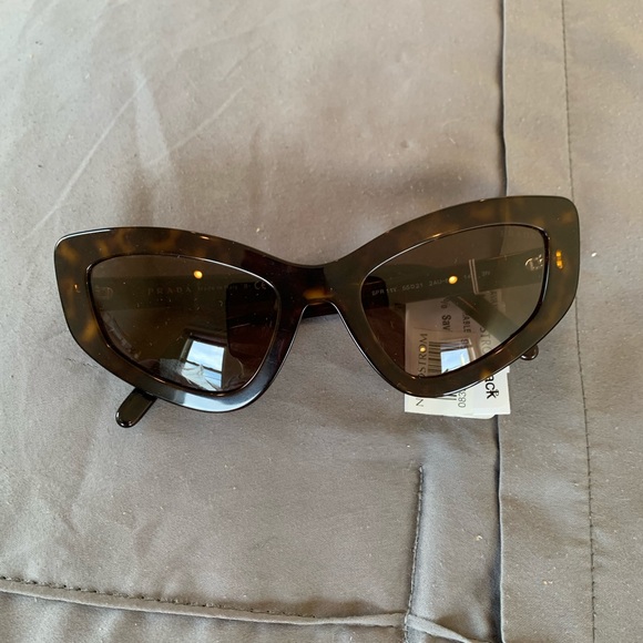 Prada
Catwalk 55mm Cat Eye Sunglasses main image 7